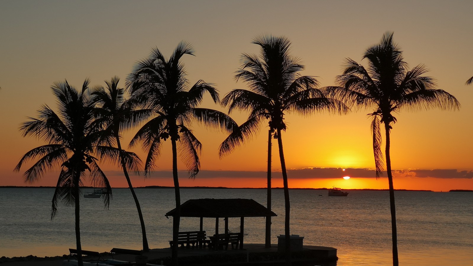 a sunset over a body of water