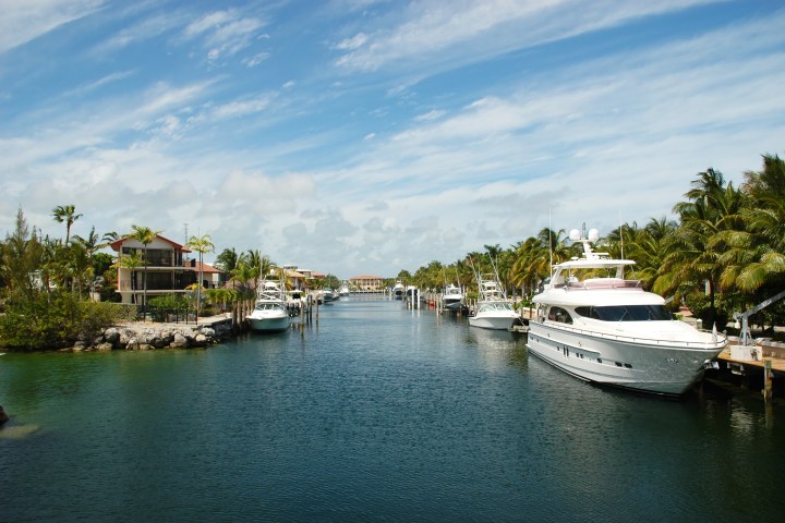 a boat is docked next to a body of water